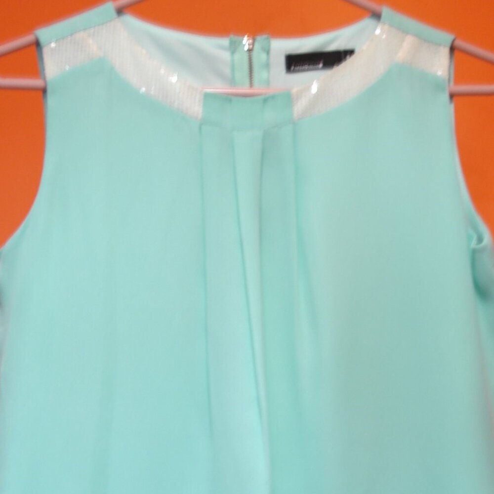 Casual Crew Neck Sleeveless Top with Lining.